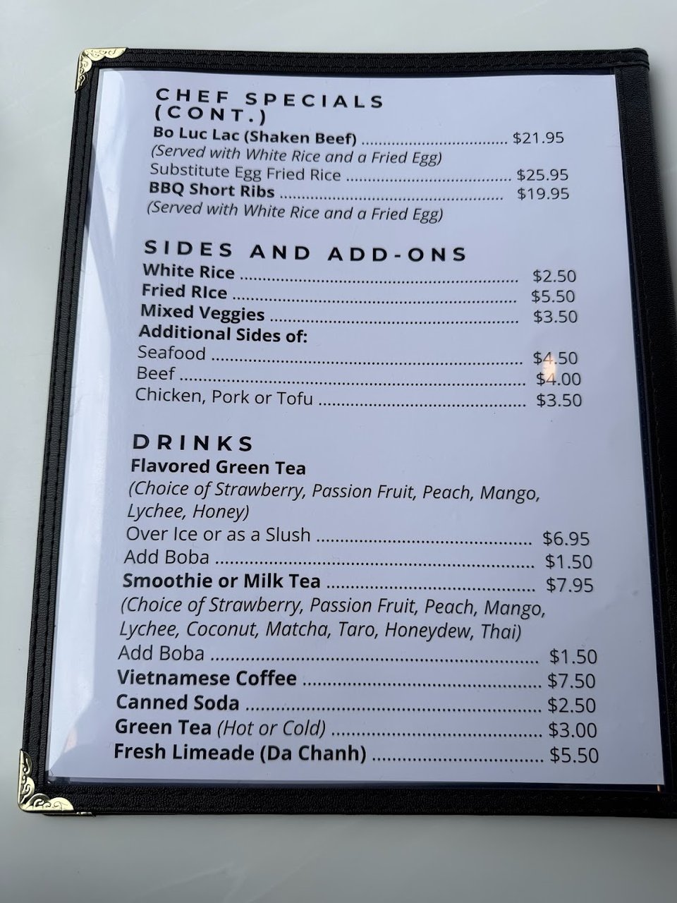 Restaurant menu page showing Vietnamese and fusion choices.